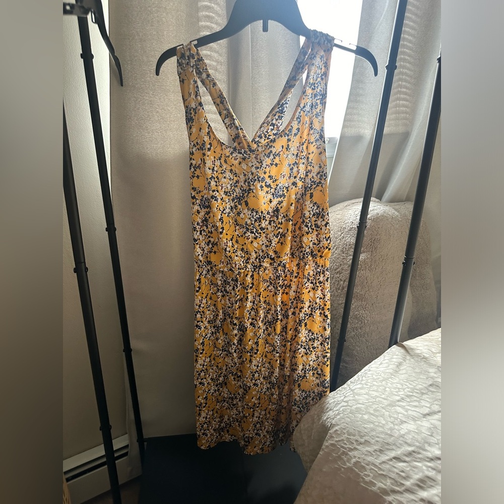 Yellow dress with blue and white flowers